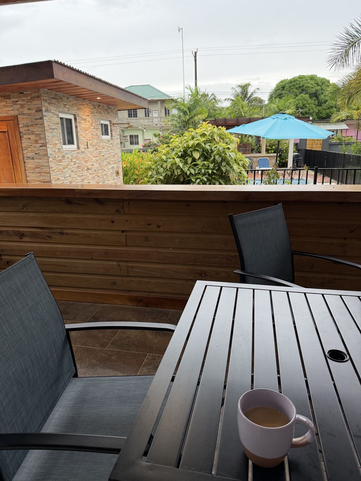 Coffee on a balcony overlooking the Paradise Palms property