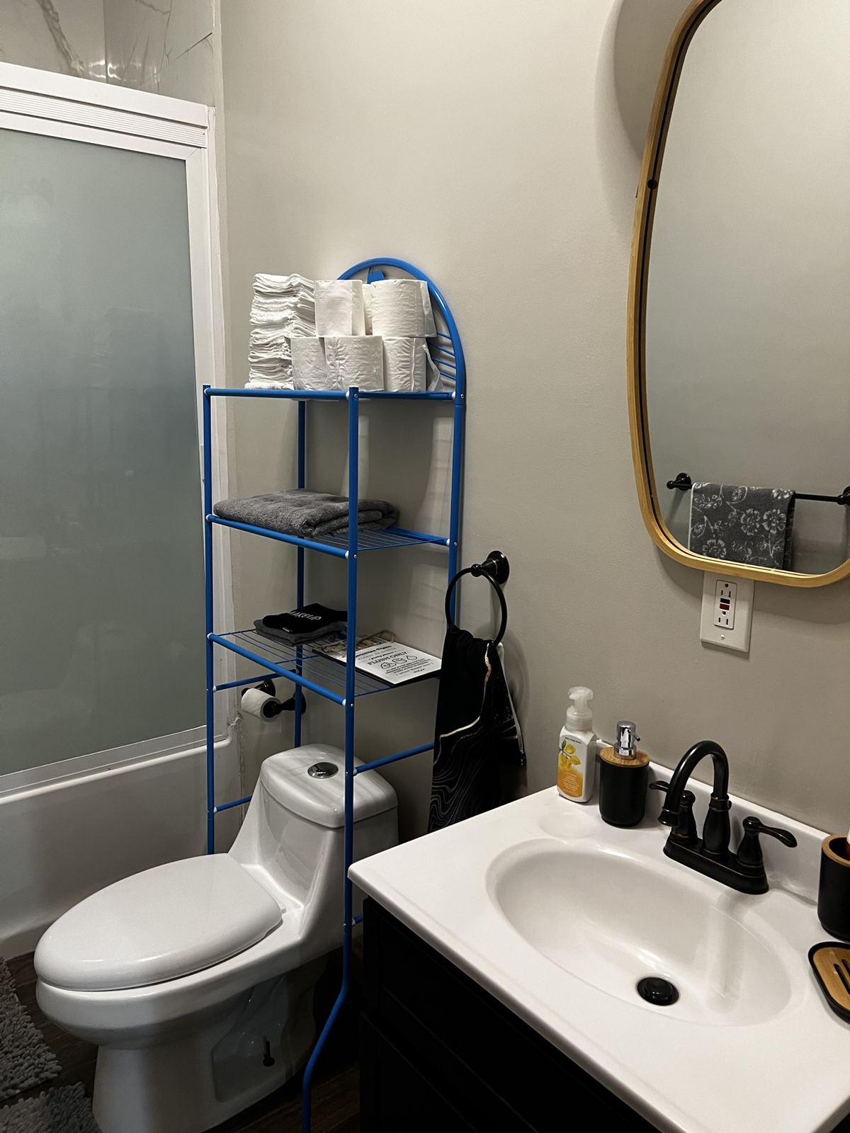 Paradise Palms bathroom with a sink, shower and fresh towels